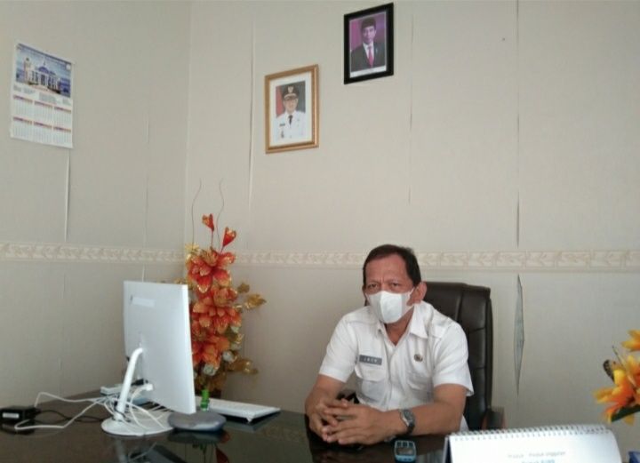 Kepala Dinas PMPTSP Kabupaten Minahasa Utara, Jack Paruntu. (Foto:Istimewa)