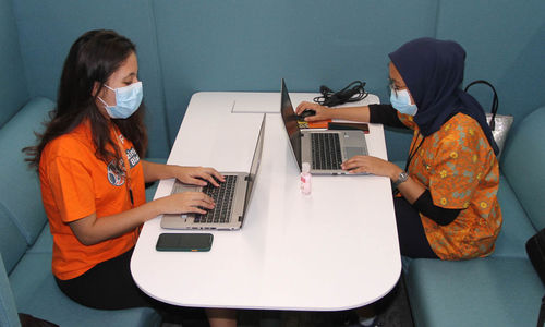 Ilustrasi pekerja kantoran. Foto : Panji Asmoro/TrenAsia