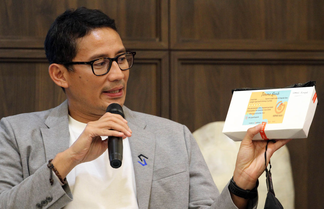  Menparekraf RI Sandiaga Salahuddin Uno  berdiskusi dalam  Kajian Ekonomi episode keenam kerjasama Kemenparekraf bersama Kampus Biznis GoFood, Jumat 8 Juli 2022. Foto : Panji Asmoro/TrenAsia