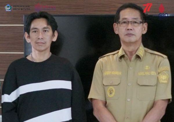 Devis Tumbel bersama Wakil Wali Kota Bitung Hengky Honandar. (Foto:Istimewa)