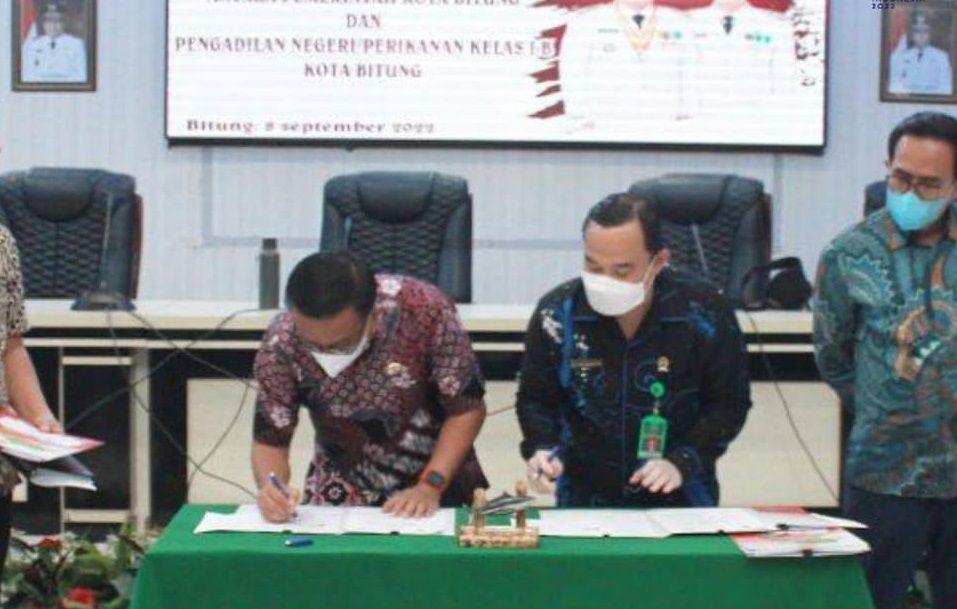 Pemerintah Kota dan Pengadilan Negeri/Perikanan Kota Bitung melakukan penanadatanganan MoU. (Foto:Istimewa)