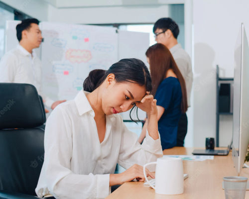 millennial-young-chinese-businesswoman-working-stress-out-with-project-research-problem-computer-desktop-meeting-room-small-modern-office-asia-people-occupational-burnout-syndrome-concept_7861-2488.webp