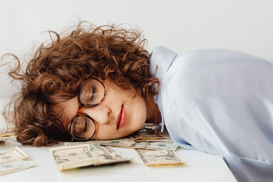 Photo by Karolina Grabowska: https://www.pexels.com/photo/woman-sleeping-on-a-desk-7680472/