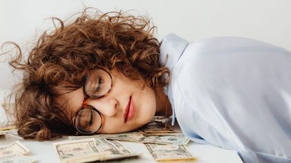 Photo by Karolina Grabowska: https://www.pexels.com/photo/woman-sleeping-on-a-desk-7680472/