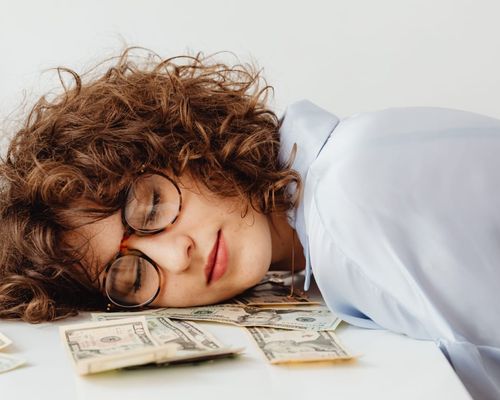 Photo by Karolina Grabowska: https://www.pexels.com/photo/woman-sleeping-on-a-desk-7680472/