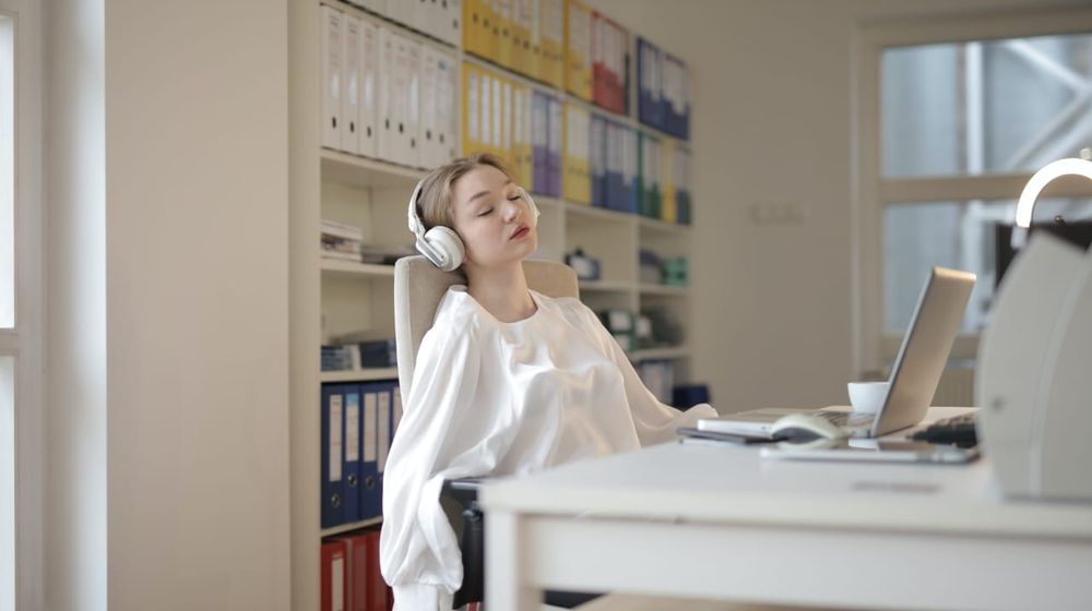 Photo by Andrea Piacquadio: https://www.pexels.com/photo/woman-in-white-dress-shirt-sitting-on-chair-3790224/