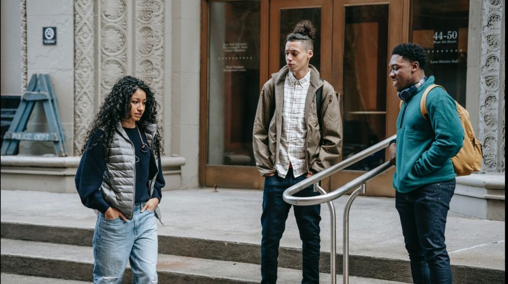 Photo by Keira Burton: https://www.pexels.com/photo/rebellious-multiracial-male-teens-mocking-at-ethnic-female-on-street-6147108/