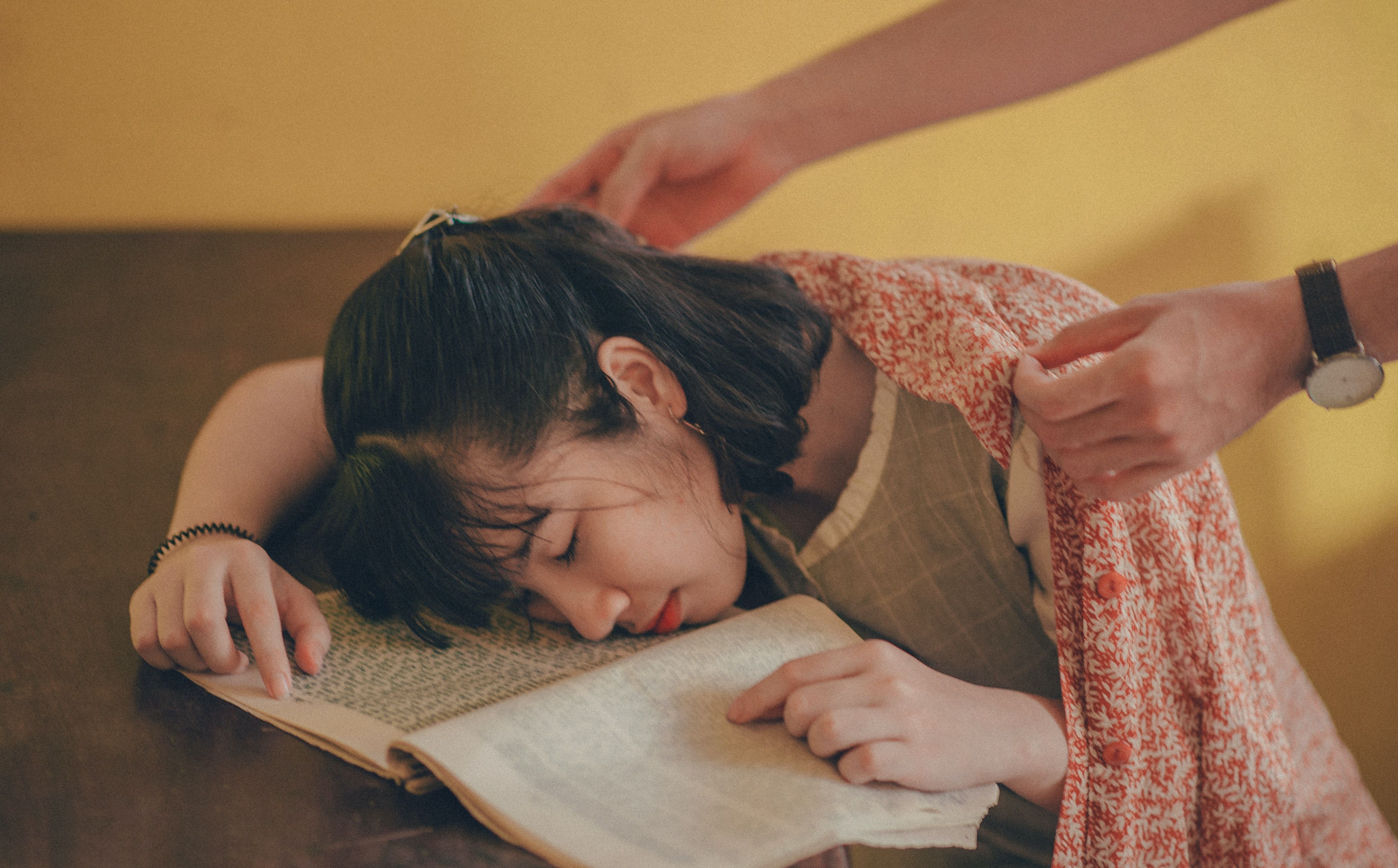 Photo by Min An: https://www.pexels.com/photo/person-covering-woman-with-blanket-1124837/