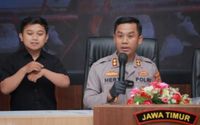 petugas kepolisian memberikan keterangan soal penculikan anak.JPG