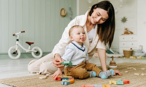 Photo by Ivan Samkov: https://www.pexels.com/photo/baby-boy-sitting-on-floor-with-tongue-out-8504293/