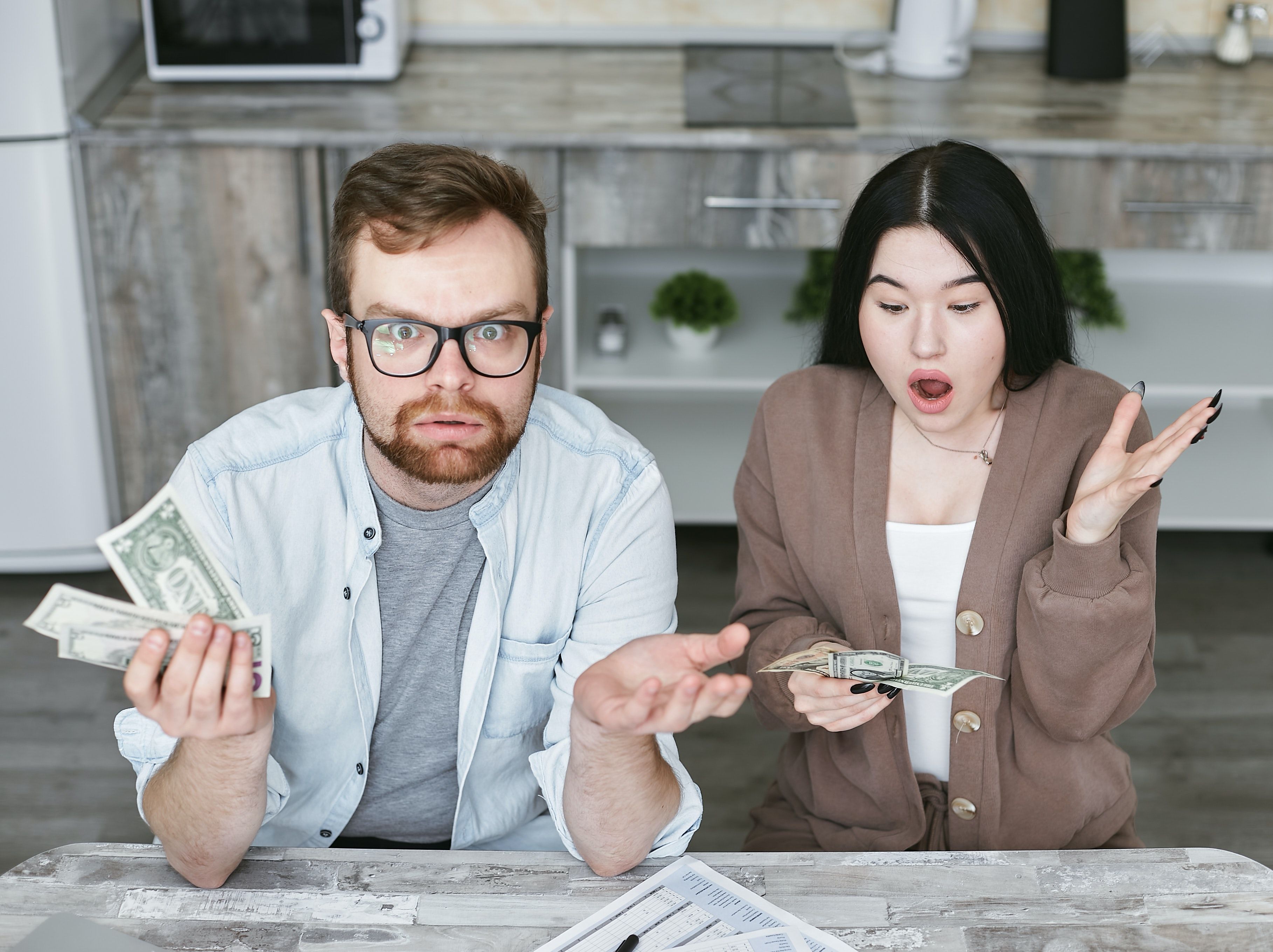 Photo by Mikhail Nilov: https://www.pexels.com/photo/a-couple-sitting-at-the-table-7735773/