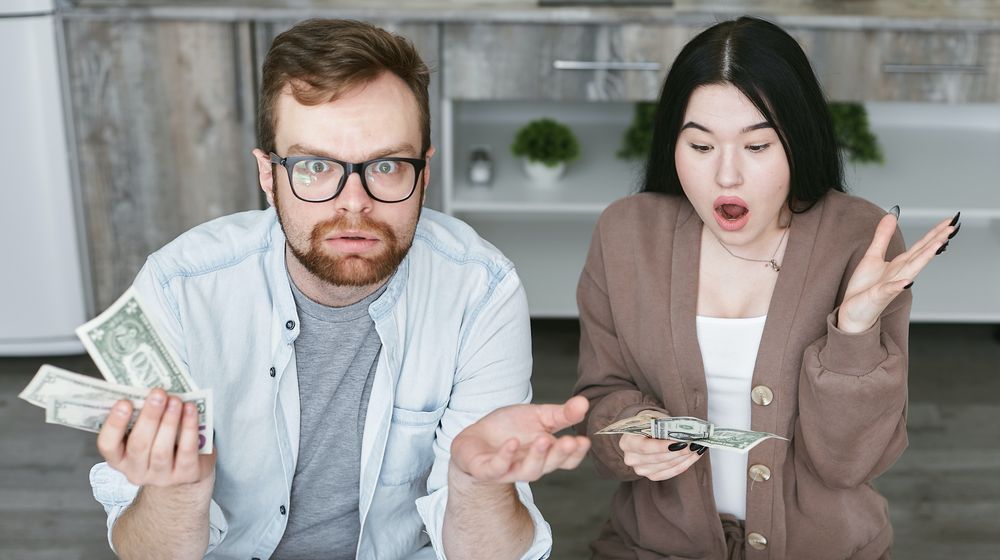 Photo by Mikhail Nilov: https://www.pexels.com/photo/a-couple-sitting-at-the-table-7735773/