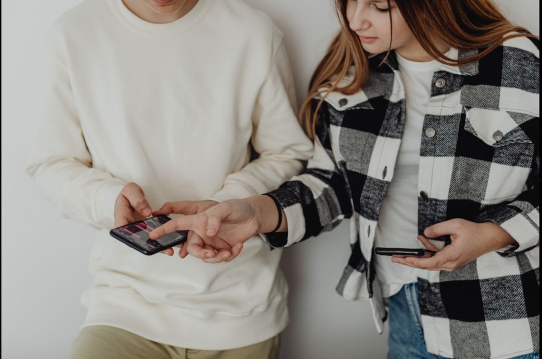 Photo by Karolina Grabowska: https://www.pexels.com/photo/young-couple-looking-at-their-smart-phones-6255975/