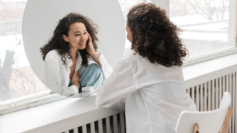 Photo by Pavel Danilyuk: https://www.pexels.com/photo/sitting-blur-reflection-face-6417918/