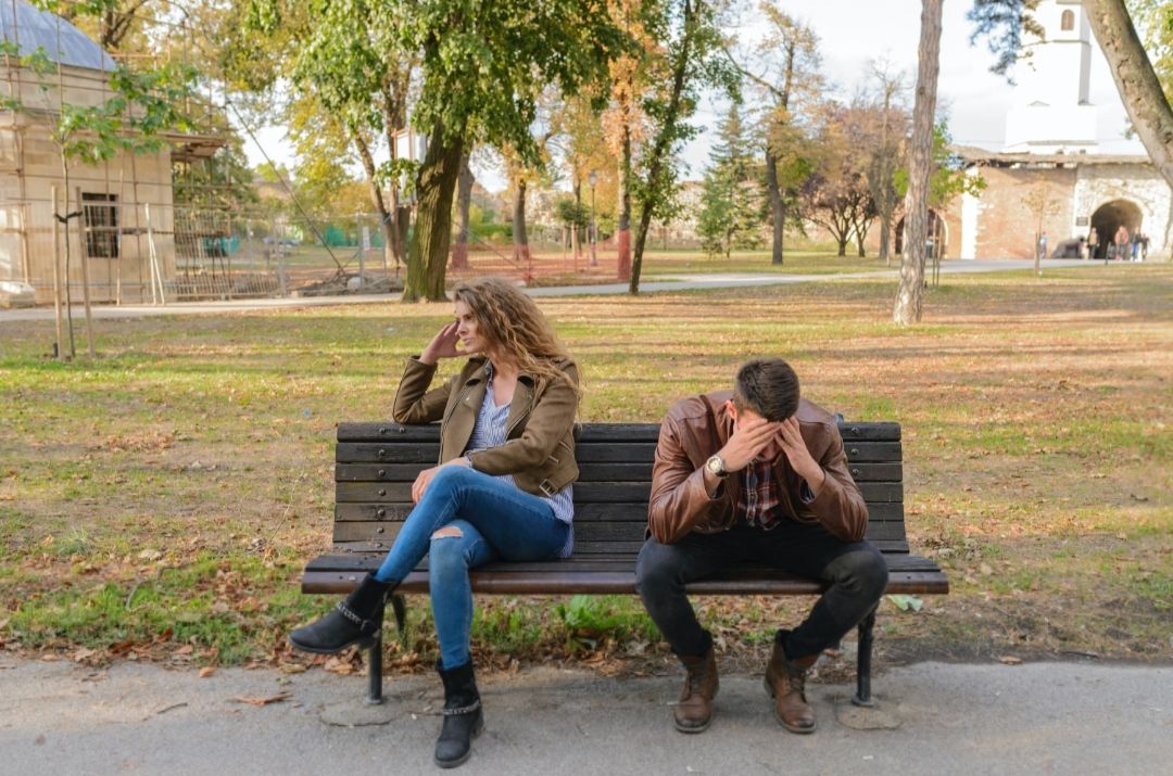 Photo by Vera Arsic: https://www.pexels.com/photo/woman-and-man-sitting-on-brown-wooden-bench-984949/