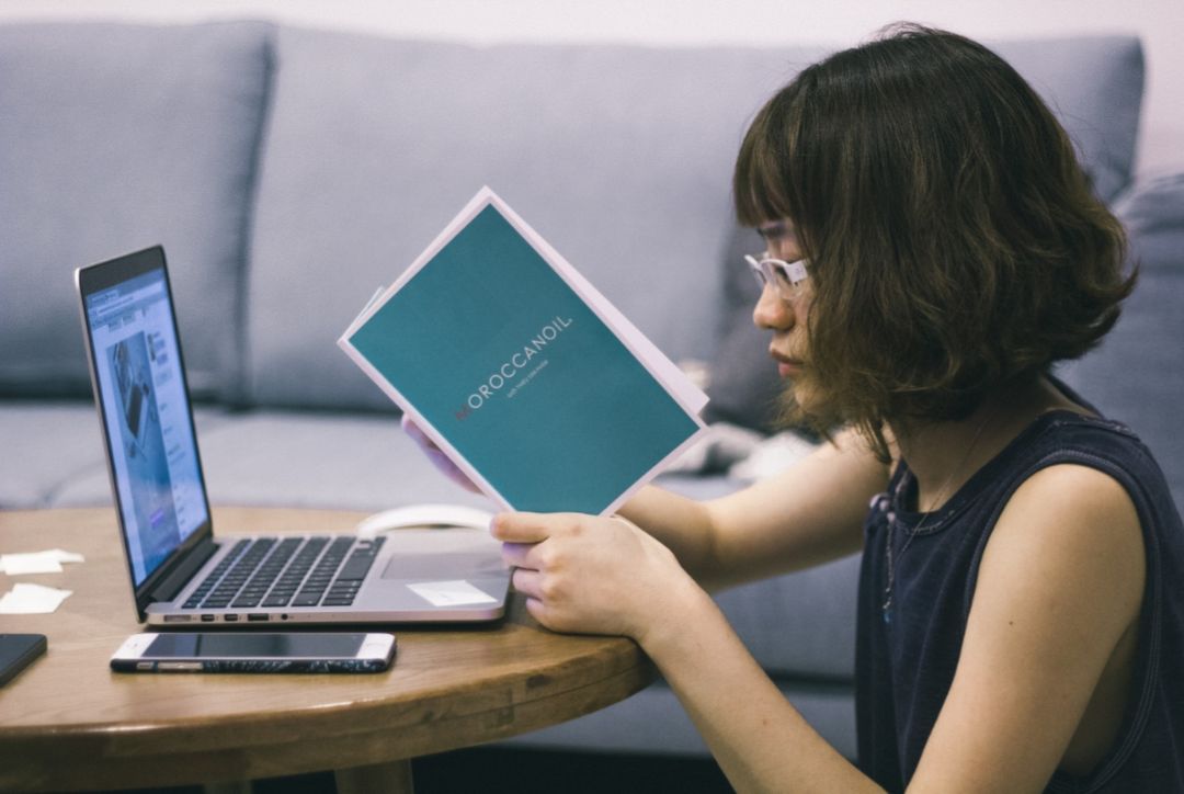 Photo by Tranmautritam: https://www.pexels.com/photo/woman-wearing-black-sleeveless-shirt-sitting-at-brown-table-92331/