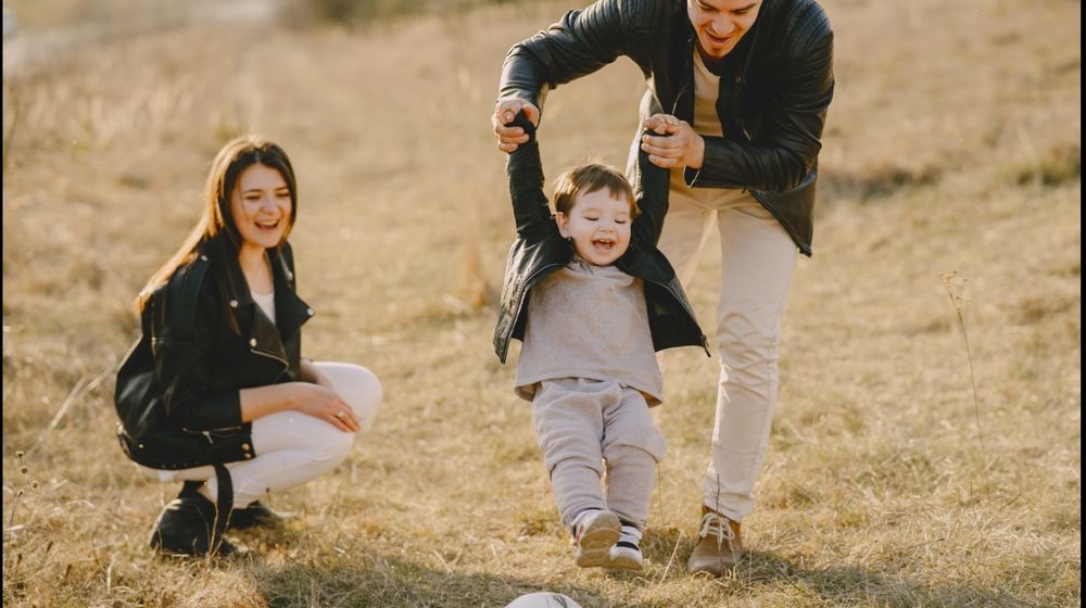 Photo by Gustavo Fring: https://www.pexels.com/photo/photo-of-family-having-fun-with-soccer-ball-4148842/