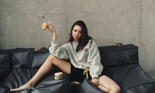 Photo by Polina Tankilevitch: https://www.pexels.com/photo/photograph-of-a-woman-sitting-with-a-donut-on-her-finger-6516037/