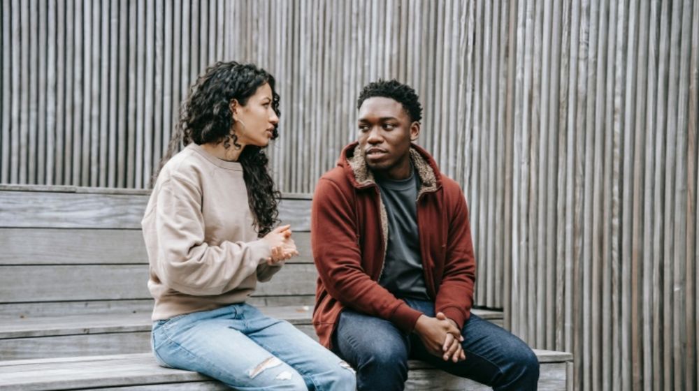 Photo by Keira Burton: https://www.pexels.com/photo/unsatisfied-multiethnic-couple-having-conversation-on-stairs-6147241/