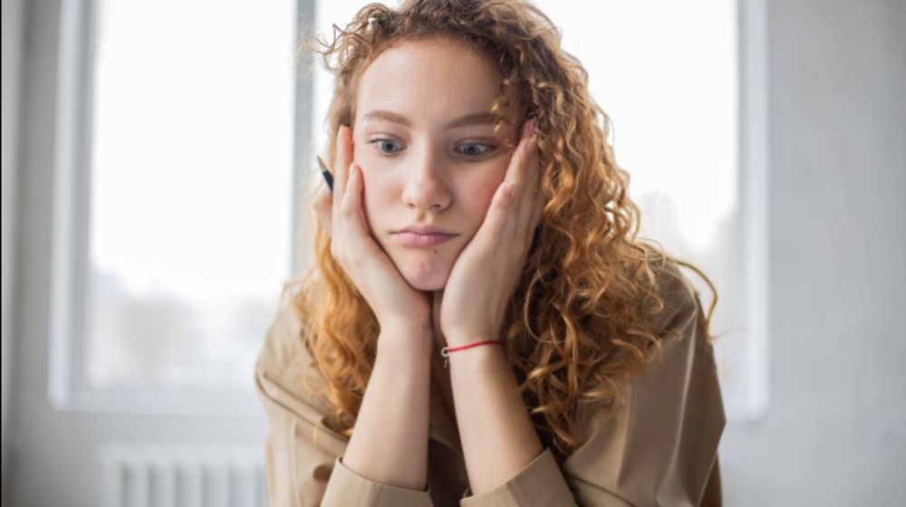 Photo by Monstera: https://www.pexels.com/photo/puzzled-woman-with-pen-studying-in-room-6237990/