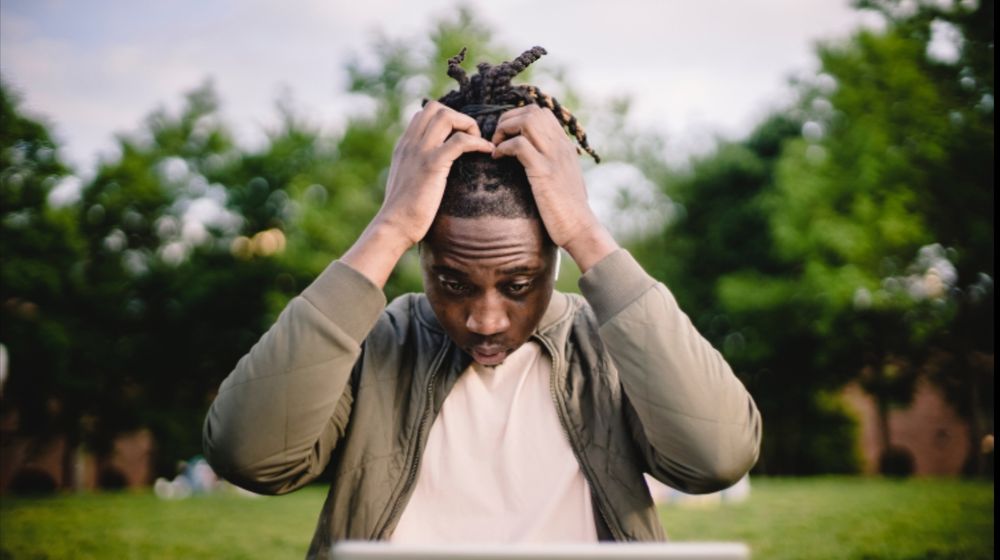 Photo by Ketut Subiyanto: https://www.pexels.com/photo/stressed-black-male-entrepreneur-working-on-laptop-in-park-4560092/