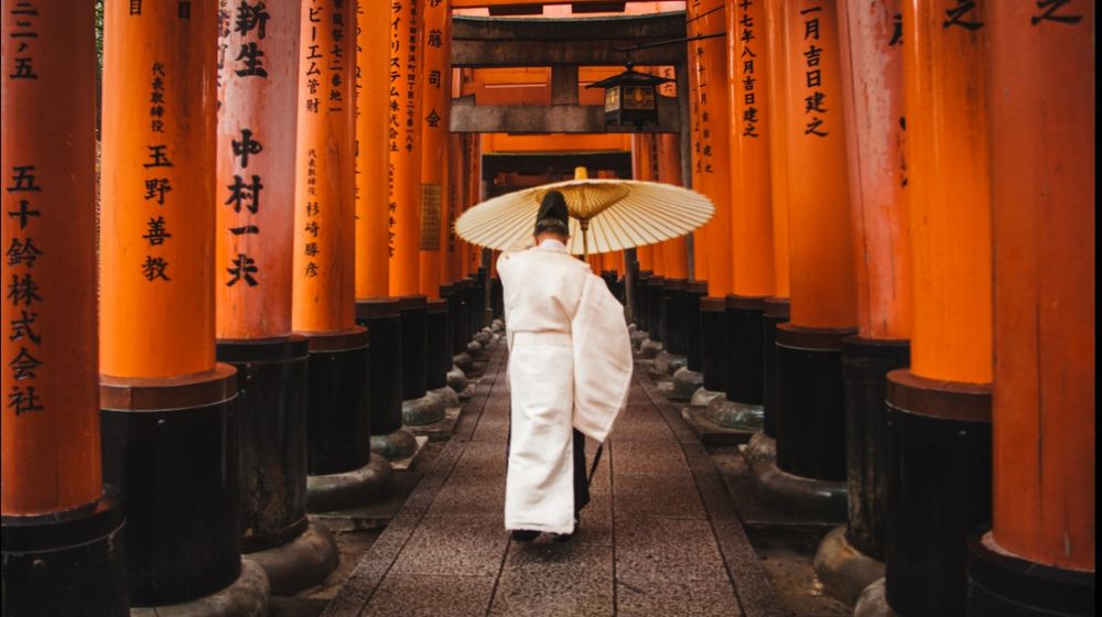 Photo by DSD: https://www.pexels.com/photo/man-holding-an-umbrella-1822605/
