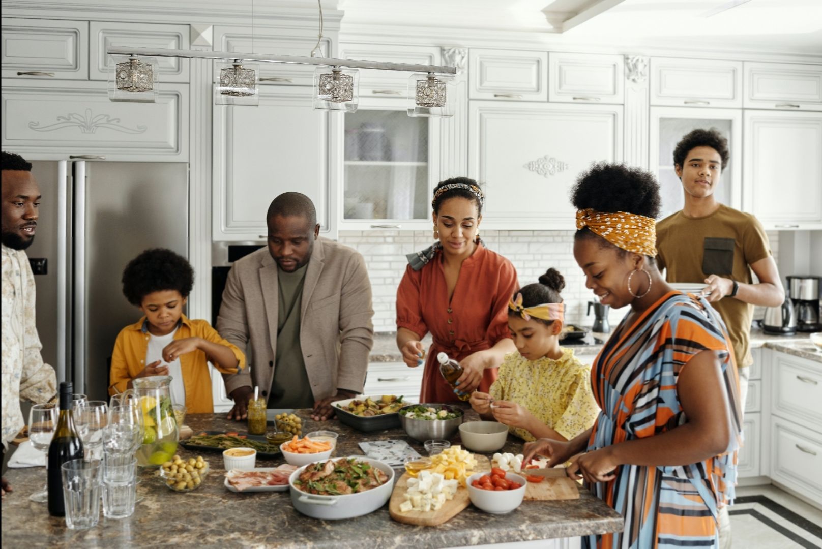 Photo by August de Richelieu: https://www.pexels.com/photo/family-preparing-food-in-the-kitchen-4262010/