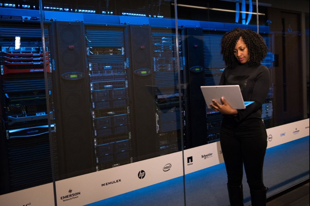 Photo by Christina Morillo: https://www.pexels.com/photo/software-engineer-standing-beside-server-racks-1181354/