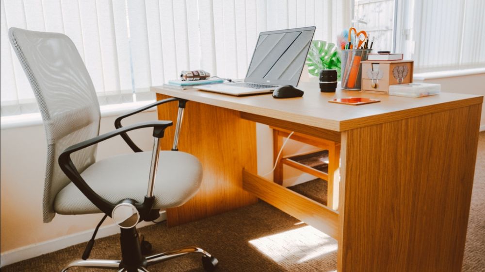 Photo by Lisa Fotios: https://www.pexels.com/photo/white-rolling-armchair-beside-table-1957478/