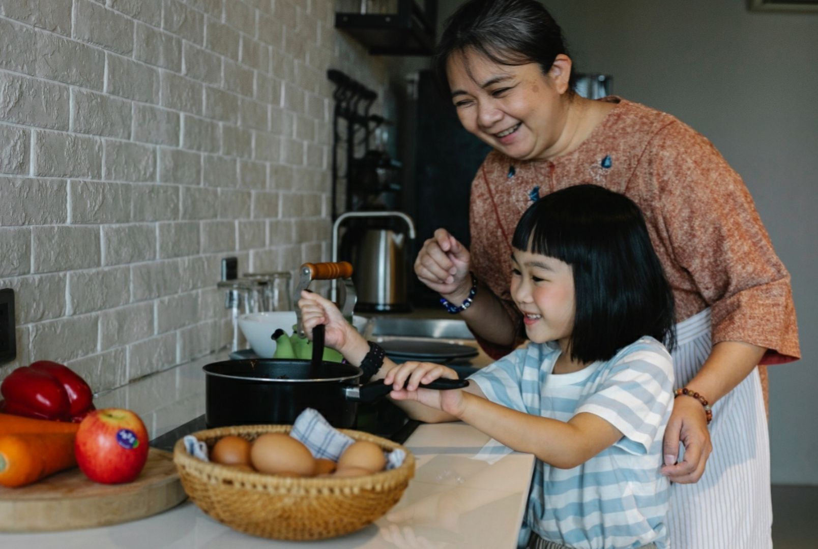 Photo by Alex Green: https://www.pexels.com/photo/asian-woman-with-granddaughter-preparing-food-5693017/