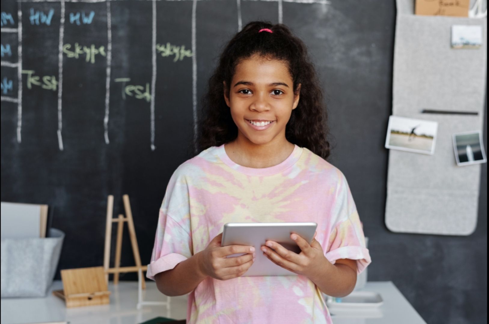 Photo by Julia M Cameron: https://www.pexels.com/photo/woman-in-pink-crew-neck-t-shirt-holding-tablet-computer-4144038/