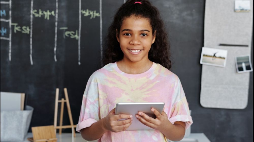 Photo by Julia M Cameron: https://www.pexels.com/photo/woman-in-pink-crew-neck-t-shirt-holding-tablet-computer-4144038/