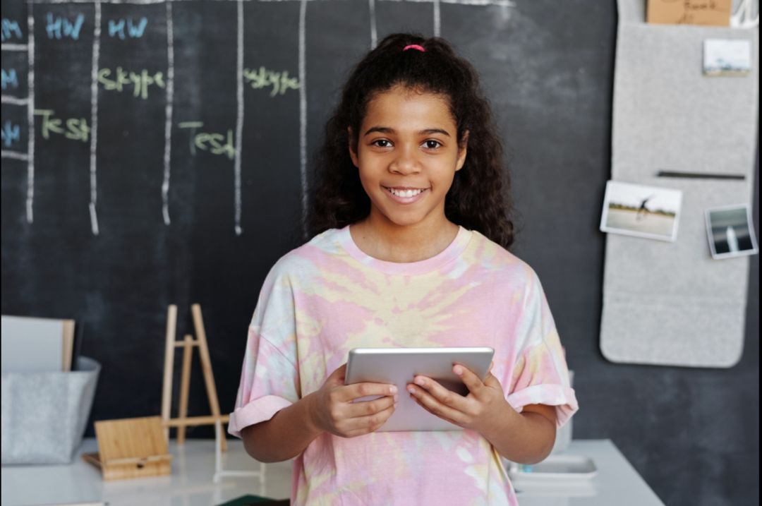 Photo by Julia M Cameron: https://www.pexels.com/photo/woman-in-pink-crew-neck-t-shirt-holding-tablet-computer-4144038/