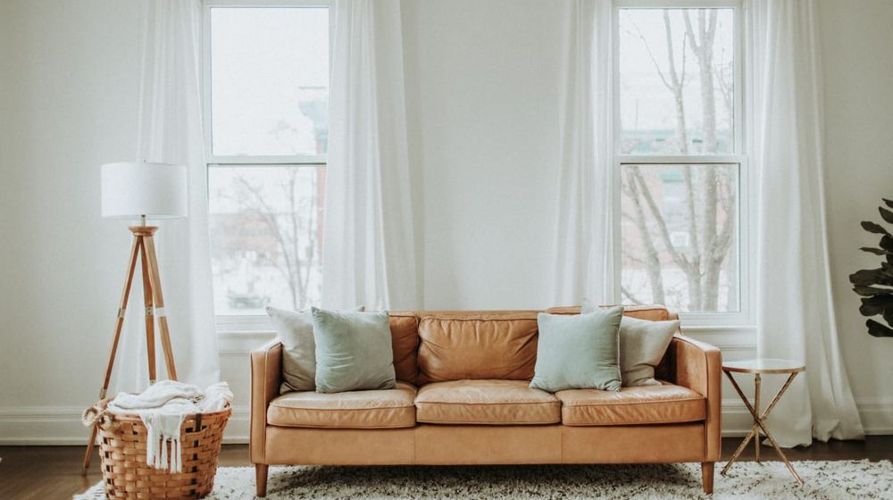 Photo by Leah Kelley: https://www.pexels.com/photo/white-and-brown-sofa-chair-near-white-window-curtain-6480707/