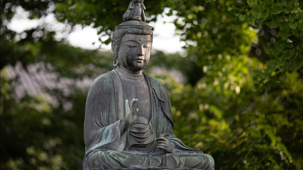 Photo by Aleksandar Pasaric: https://www.pexels.com/photo/buddha-statue-near-trees-1344472/