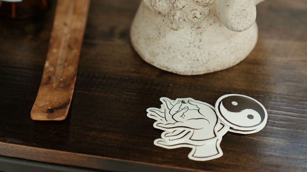 Photo by Klub Boks: https://www.pexels.com/photo/man-praying-over-yin-yang-symbol-10868856/