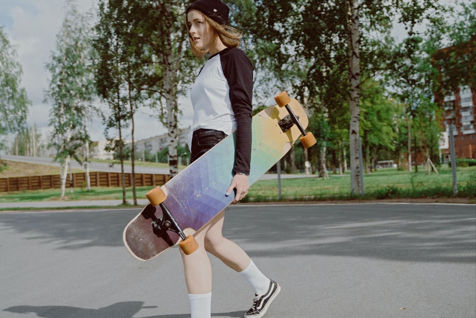 Photo by cottonbro studio: https://www.pexels.com/photo/woman-in-white-and-black-long-sleeve-shirt-holding-a-longboard-5026425/