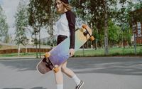 Photo by cottonbro studio: https://www.pexels.com/photo/woman-in-white-and-black-long-sleeve-shirt-holding-a-longboard-5026425/