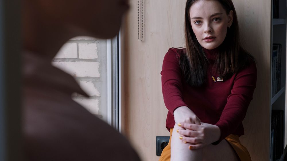 Photo by cottonbro studio: https://www.pexels.com/photo/a-female-teenager-wearing-red-long-sleeves-6214650/