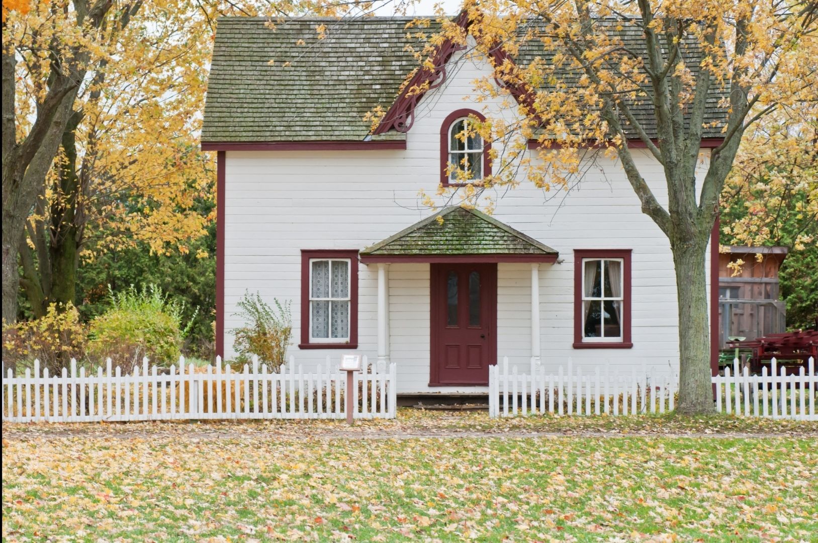 Photo by Scott Webb: https://www.pexels.com/photo/white-and-red-wooden-house-with-fence-1029599/