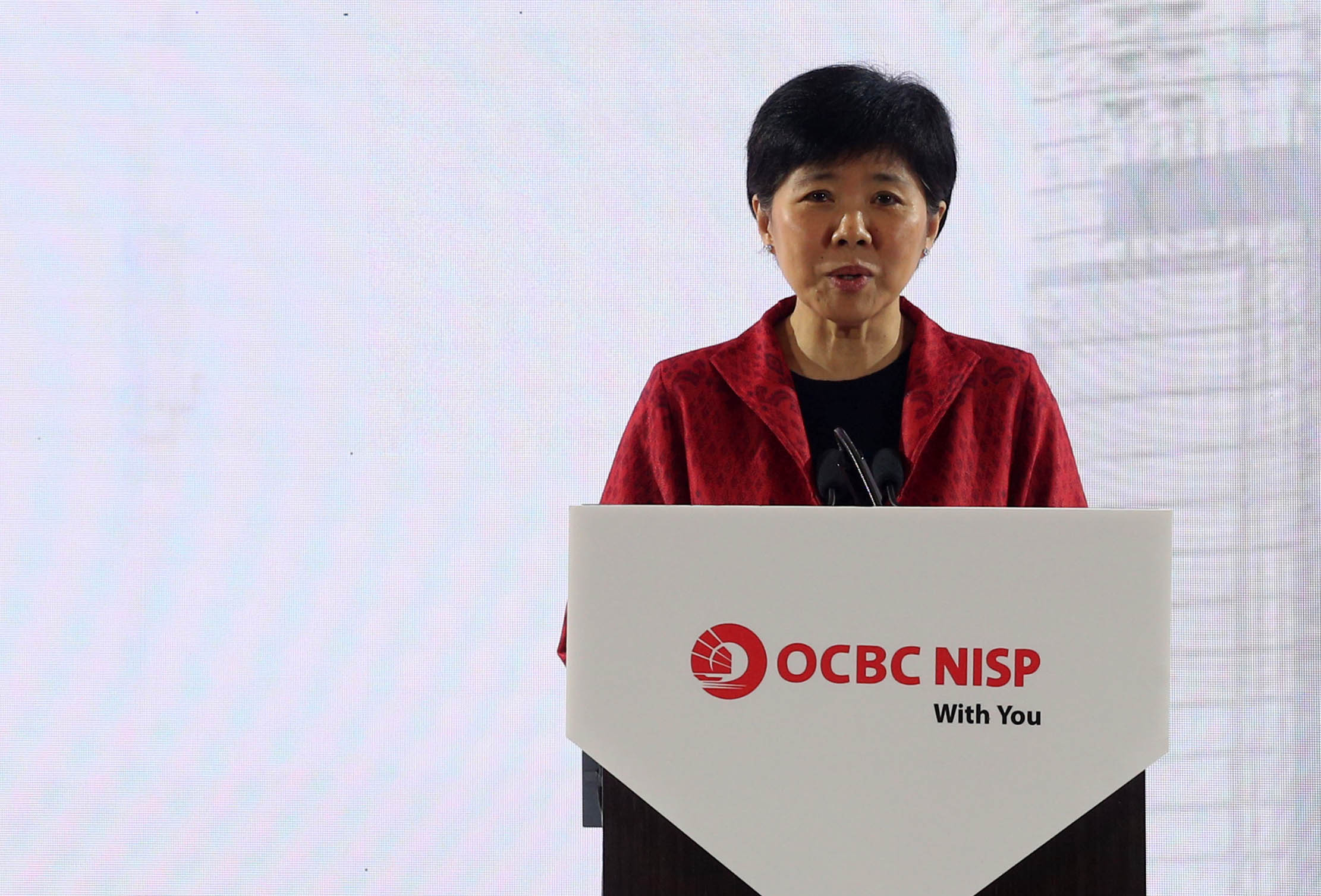 Presiden Direktur Bank OCBC NISP Parwati Surjaudaja saat membuka acara OCBC NISP Business Forum 2023 yang berlangsung di Jakarta 21 Maret 2023. Foto : Panji Asmoro/TrenAsia