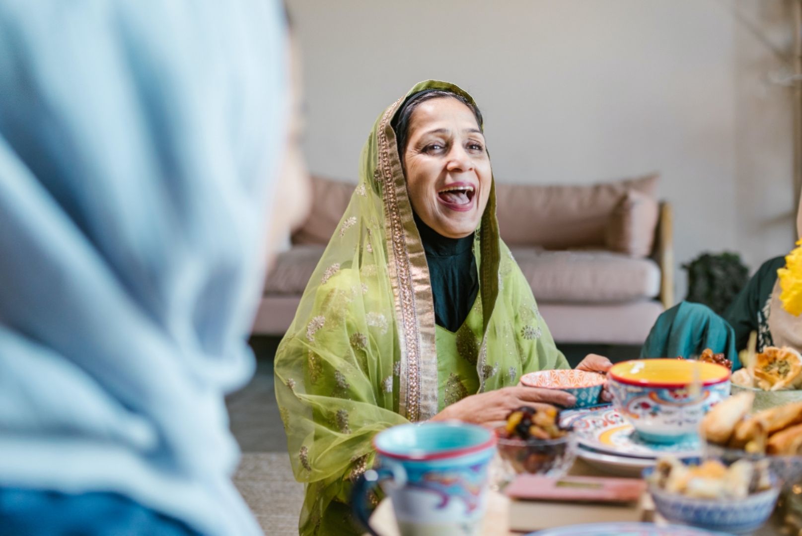 Photo by RODNAE Productions: https://www.pexels.com/photo/smiling-woman-in-green-hijab-7249772/