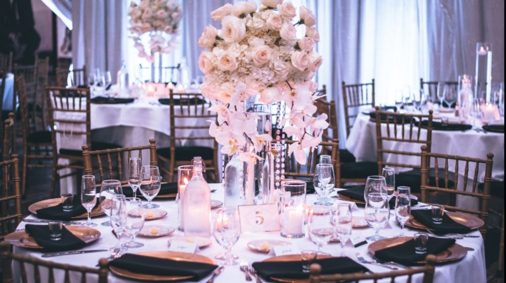 Photo by Tae Fuller: https://www.pexels.com/photo/pink-and-white-roses-centerpiece-on-top-of-table-1616113/