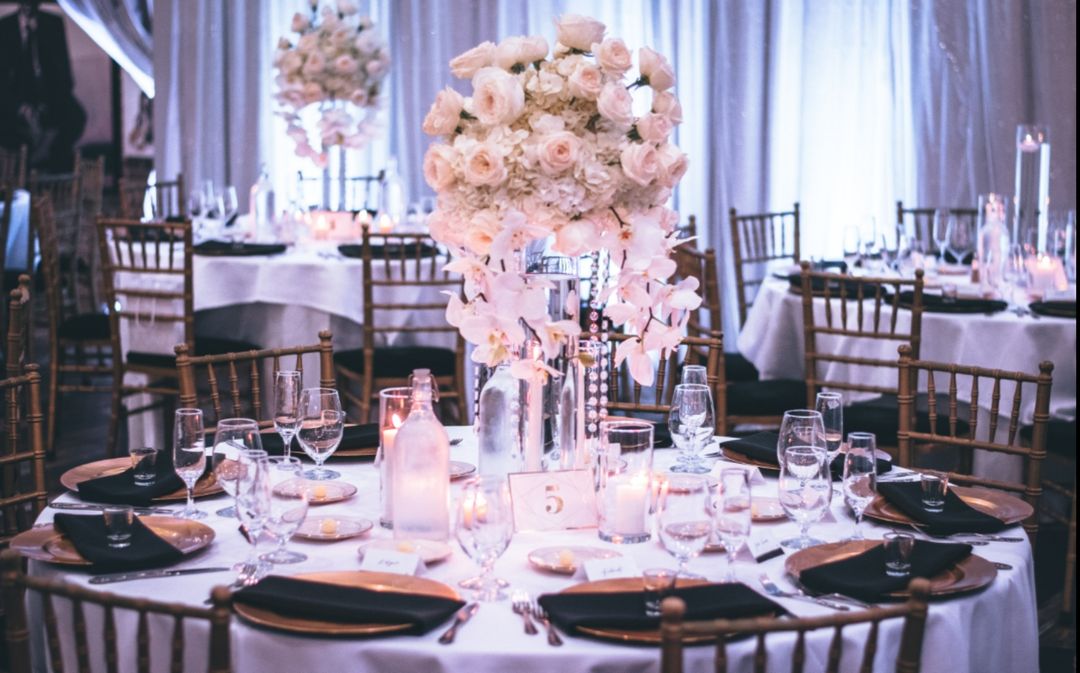 Photo by Tae Fuller: https://www.pexels.com/photo/pink-and-white-roses-centerpiece-on-top-of-table-1616113/