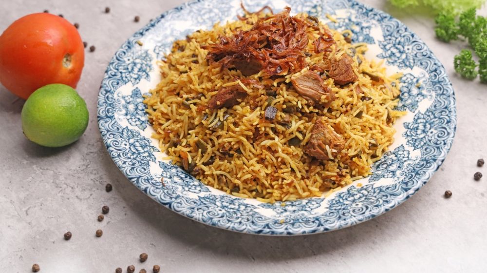 Photo by Shameel mukkath: https://www.pexels.com/photo/rice-biryani-dish-on-blue-plate-14731729/