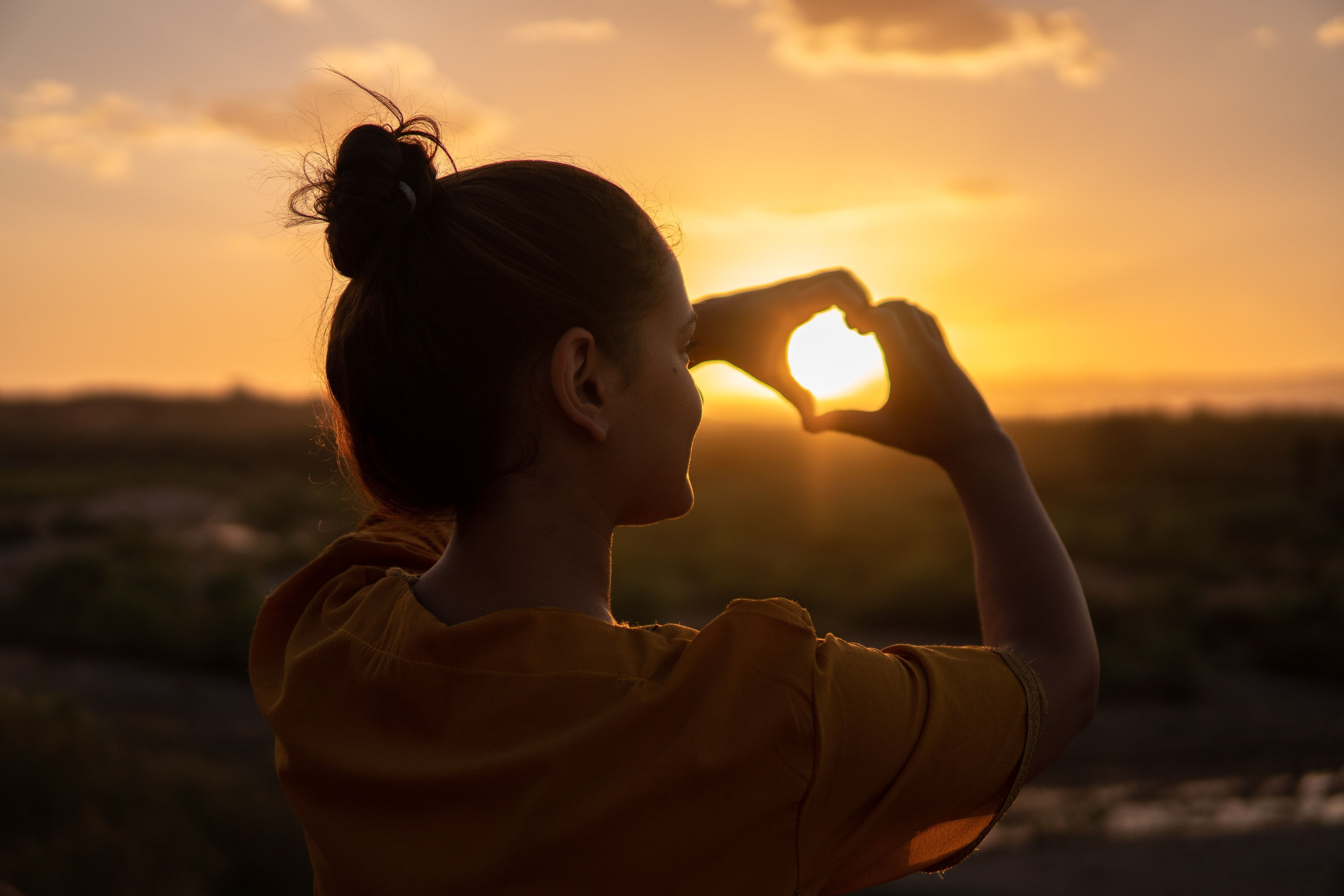 Photo by Hassan OUAJBIR: https://www.pexels.com/photo/woman-doing-hand-heart-sign-1535244/