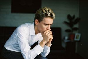 Photo by Anastasiya Vragova: https://www.pexels.com/photo/nervous-young-man-leaning-on-hand-and-thinking-in-room-6770739/
