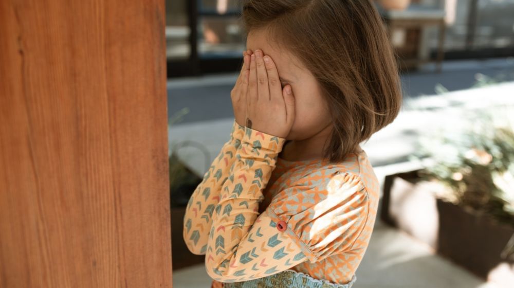 Photo by RDNE Stock project: https://www.pexels.com/photo/girl-in-multi-colored-long-sleeve-shirt-covering-her-face-6182311/