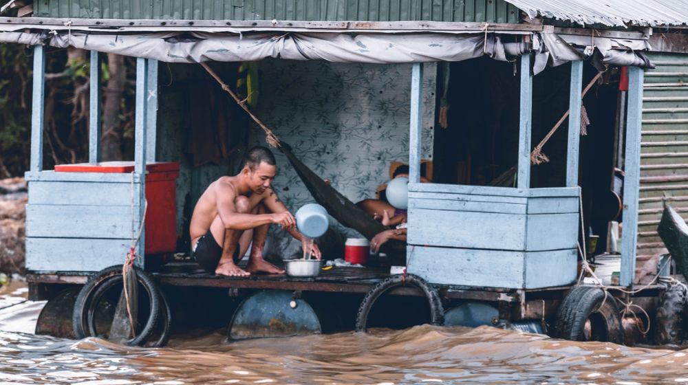 Photo by hitesh choudhary: https://www.pexels.com/photo/man-pouring-water-from-dipper-on-blue-and-grey-house-1739855/
