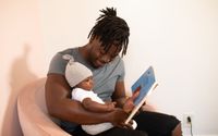 Photo by nappy: https://www.pexels.com/photo/a-father-reading-a-book-to-his-baby-3536643/